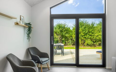 Kamile - 500M from the Sea: Interior Design, Home Door, Glass, Hardwood, Living Room, Houseplant, Wood Flooring, Design, Chair
