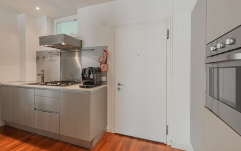 Caminito: Kitchen Appliance, Kitchen, Flooring, Major Appliance, Interior Design, Wall, Countertop, Wood, Cabinetry, Floor