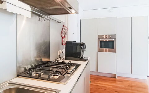 Gigi: Kitchen Appliance, Kitchen, Countertop, Major Appliance, Kitchen Stove, Flooring, Home Appliance, Interior Design, Wood, Stove