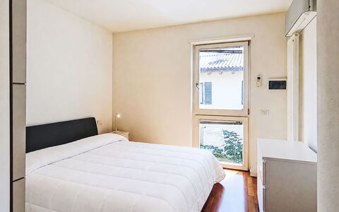 Gigi: Bed, Bedroom, Interior Design, Wall, Floor, Flooring, Bed Sheet, Wood, Bedding, Room