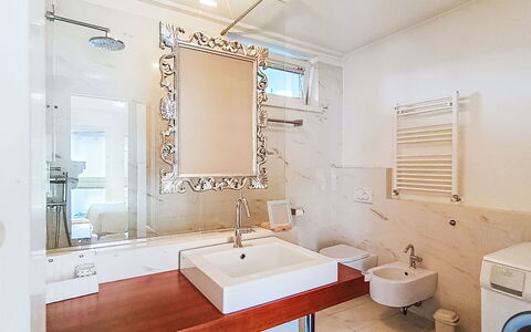 Gigi: Interior Design, Plumbing Fixture, Bathroom, Bathroom Sink, Wall, Flooring, Sink, Mirror, Floor, Tap