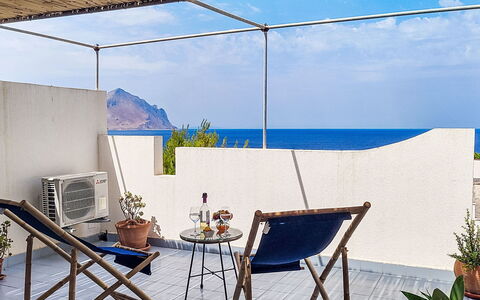 Cala Isulidda: Furniture, Chair, Outdoor Furniture, Sea, Shade, Ocean, Balcony, Outdoor Table, Coffee Table, Coast