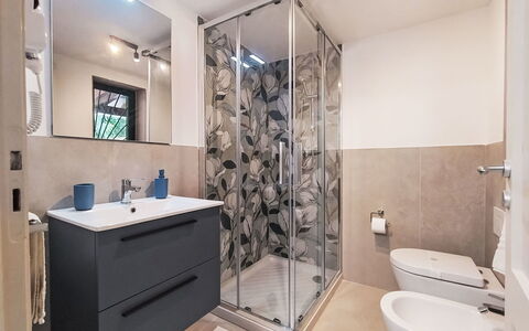 Cala Isulidda: Bathroom, Flooring, Plumbing Fixture, Floor, Interior Design, Sink, Bathroom Cabinet, Bathroom Sink, Tap, Toilet