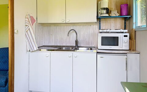 Lötstugan: Kitchen, Wood, Kitchen Sink, Interior Design, Flooring, Sink, Floor, Countertop, Major Appliance, Plumbing Fixture