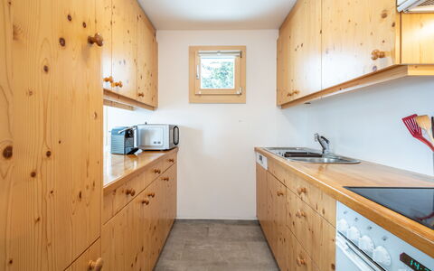 Casa Collina 5I-02: Wood, Kitchen, Ceiling, Interior Design, Flooring, Countertop, Cabinetry, Room, Wood Stain, Drawer