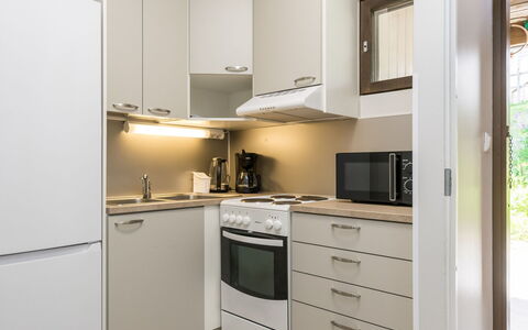 Heinävesi Homes D5: Kitchen Appliance, Kitchen, Countertop, Furniture, Major Appliance, Interior Design, Cabinetry, Wall, Flooring, Wood
