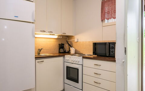 Heinävesi Homes D7: Kitchen Appliance, Major Appliance, Kitchen, Interior Design, Countertop, Wood, Furniture, Flooring, Cabinetry, Floor