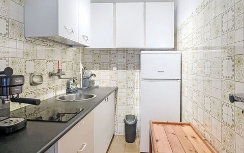 Bluhome: Flooring, Kitchen, Major Appliance, Kitchen Appliance, Countertop, Floor, Interior Design, Plumbing Fixture, Cabinetry, Sink