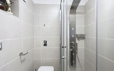 Bluhome: Bathroom, Plumbing Fixture, Flooring, Interior Design, Shower Head, Floor, Shower, Plumbing, Toilet, Tile