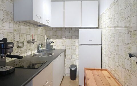 Bluhome: Major Appliance, Flooring, Kitchen, Kitchen Appliance, Countertop, Floor, Interior Design, Sink, Plumbing Fixture, Cabinetry
