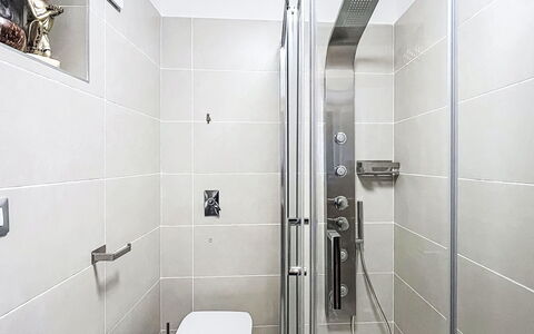 Bluhome: Bathroom, Plumbing Fixture, Flooring, Interior Design, Floor, Shower Head, Shower, Plumbing, Toilet, Tile