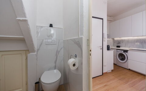 Casa Vacanze al Teatro: Flooring, Floor, Wall, Plumbing Fixture, Interior Design, Bathroom, Sink, Toilet, Ceiling, Plumbing