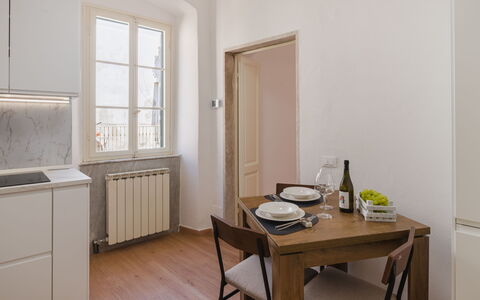 Casa Vacanze al Teatro: Furniture, Flooring, Interior Design, Wood, Floor, Kitchen & Dining Room Table, Kitchen, Ceiling, Table, Wood Flooring