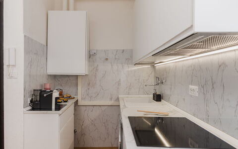 Casa Vacanze al Teatro: Kitchen, Countertop, Kitchen Appliance, Interior Design, Flooring, Major Appliance, Cabinetry, Kitchen Stove, Ceiling, Floor