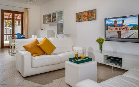 Villa delle Sirene 6: Furniture, Interior Design, Couch, Flooring, Living Room, Floor, Room, Television, Ceiling, Table