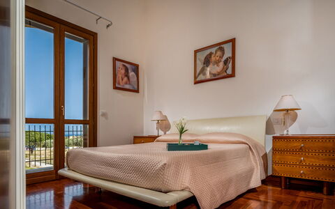 Villa delle Sirene 6: Furniture, Bed, Interior Design, Bedroom, Wall, Flooring, Floor, Wood, Bed Sheet, Room