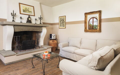 Villa Augusto 10: Furniture, Interior Design, Flooring, Wood, Room, Floor, Living Room, Lighting, Couch, Hearth