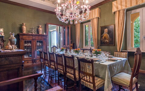 Villa Michelangelo 14: Furniture, Interior Design, Table, Chandelier, Ceiling, Chair, Dining Room, Lighting, Light Fixture, Room