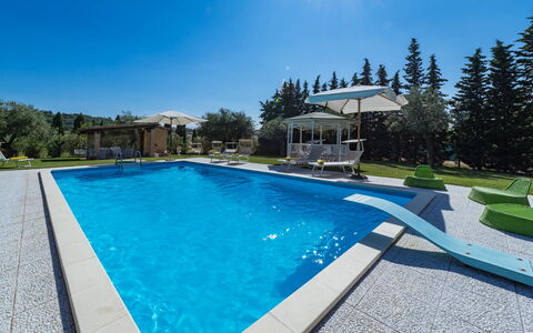 Il Podere di Fi 8: Swimming Pool, Blue, Resort, Leisure, Composite Material, Shade, Garden, Eco Hotel, Landscaping, Outdoor Furniture