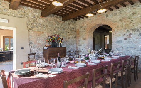 Podere Collelungo 14: Wall, Furniture, Table, Kitchen & Dining Room Table, Estate, Chair, Farmhouse, Hacienda, Dining Room, Stone Wall