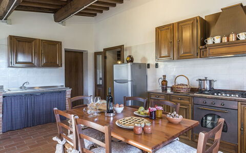 Podere Collelungo 14: Furniture, Kitchen, Flooring, Wood, Interior Design, Cabinetry, Countertop, Kitchen Appliance, Room, Floor