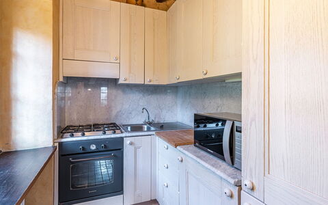 Il Roseto 10: Kitchen, Countertop, Cabinetry, Kitchen Appliance, Major Appliance, Wood, Flooring, Interior Design, Kitchen Sink, Floor