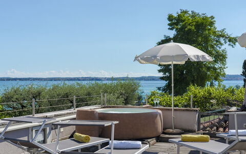 Arcimboldo House 2+2: Water, Outdoor Furniture, Furniture, Umbrella, Chair, Coastal And Oceanic Landforms, Sea, Shade, Outdoor Table, Coast