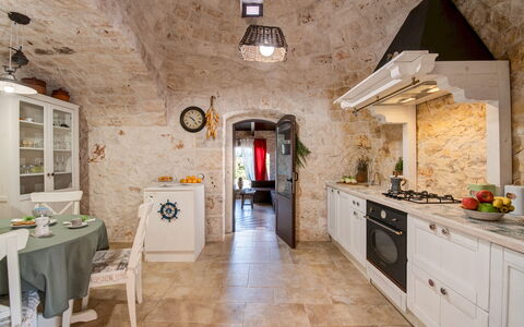 Trulli Littoria 4: Interior Design, Flooring, Furniture, Ceiling, Floor, Lighting, Kitchen, Arch, Light Fixture, Chair