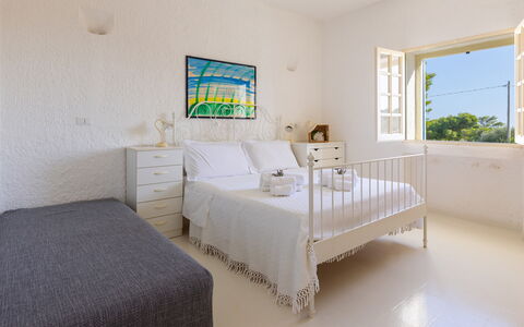 Villa del Lentisco 8+2: Furniture, Wall, Floor, Interior Design, Bedroom, Bed, Flooring, Ceiling, Apartment, Bedding