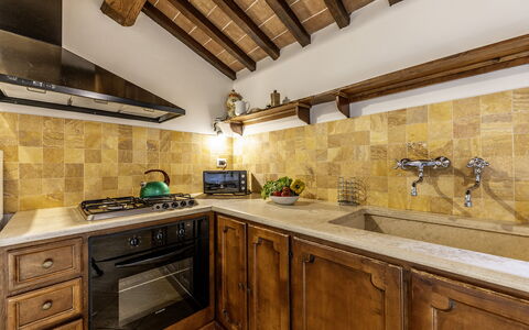 Casale dei 12: Flooring, Wood, Kitchen, Countertop, Interior Design, Floor, Ceiling, Cabinetry, Lighting, Home