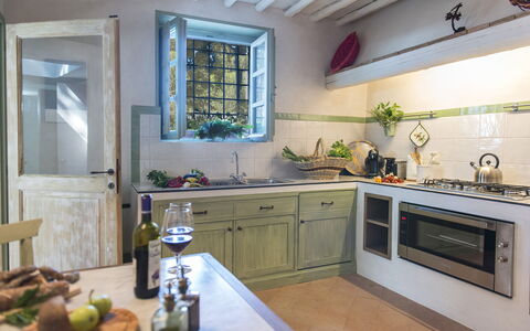 Villa delle Upupe 8: Kitchen, Interior Design, Furniture, Flooring, Countertop, Kitchen Appliance, Home, Cabinetry, Major Appliance, Lighting