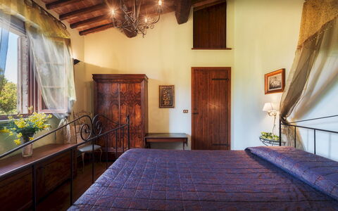Casale dei Girasoli 14: Furniture, Bed, Linens, Houseplant, Bed Frame, Bedroom, Chair, Lamp, Bedding, Wood Stain