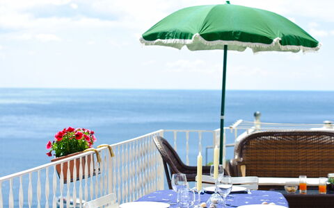 Casa Leonilde 4: Furniture, Outdoor Furniture, Table, Sea, Tablecloth, Chair, Outdoor Table, Tableware, Ocean, Coastal And Oceanic Landforms