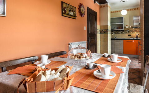 Villa Miki 10: Interior Design, Furniture, Room, Floor, Flooring, Ceiling, Lighting, Orange, Apartment, Wood Stain