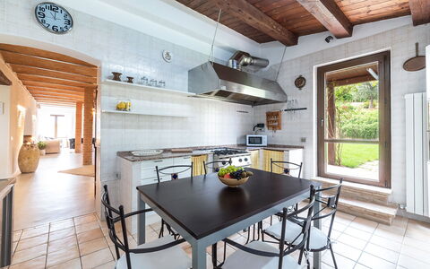Villa Casanostra 12: Furniture, Interior Design, Flooring, Kitchen, Wood, Countertop, Floor, Ceiling, Home, Room