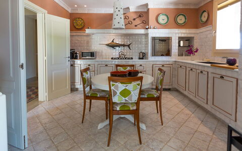 Villa Majoli 9: Furniture, Interior Design, Flooring, Kitchen, Floor, Countertop, Cabinetry, Wood, Chair, Light Fixture