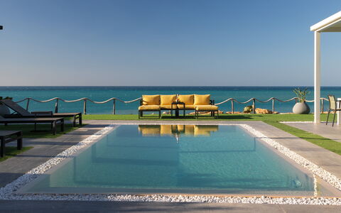 Villa Sabbie Rosse 6: Blue, Water, Body Of Water, Outdoor Furniture, Sea, Swimming Pool, Resort, Ocean, Coastal And Oceanic Landforms, Furniture
