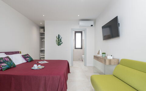 Villa Sabbie Rosse 6: Furniture, Interior Design, Flooring, Floor, Bed, Wall, Bedroom, Wood, Room, Ceiling