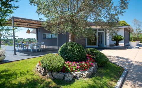 Villa Atmosfere 8: Shrub, Garden, Home, Residential Area, Land Lot, Shade, Estate, Groundcover, Landscaping