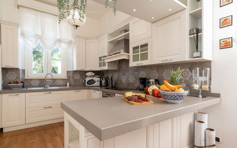 Villa Callari 6+2: Kitchen, Countertop, Cabinetry, Furniture, Kitchen Appliance, Interior Design, Wood, Flooring, Major Appliance, Home