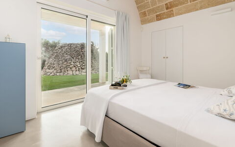 Villa la Pupazza 8: Bedroom, Interior Design, Flooring, Bed, Floor, Home, Ceiling, Furniture, Linens, Bedding