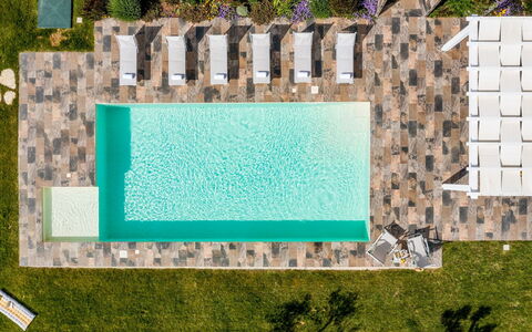 Dama dei Venti 6+2: Swimming Pool, Resort, Outdoor Furniture, Flooring, Composite Material, Leisure, Eco Hotel, Thermae, Water Feature, Chair