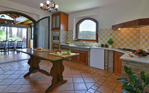 Villa Biddizza 10: Furniture, Interior Design, Kitchen, Flooring, Countertop, Home, Ceiling, Lighting, Chair, Floor