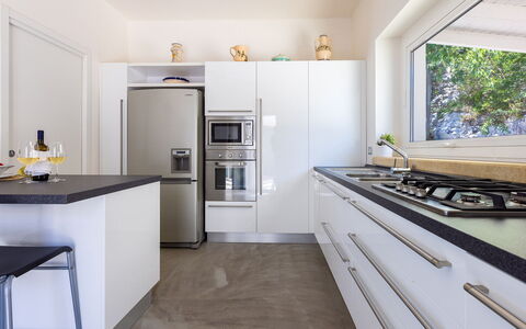 Villa Calypso 8: Kitchen Appliance, Kitchen, Countertop, Interior Design, Major Appliance, Cabinetry, Furniture, Flooring, Home Appliance, Wood