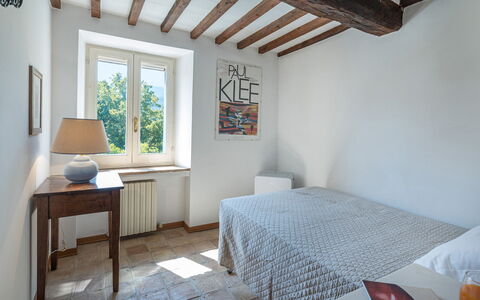 Casale le Querce di Cetona 8: Wall, Bedroom, Bed, Wood, Interior Design, Furniture, Bed Sheet, Flooring, Bedding, Floor