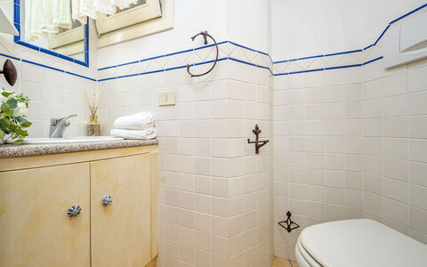 Villa Stella 6: Bathroom, Plumbing Fixture, Flooring, Floor, Interior Design, Plumbing, Toilet, Tile, Tap, Towel
