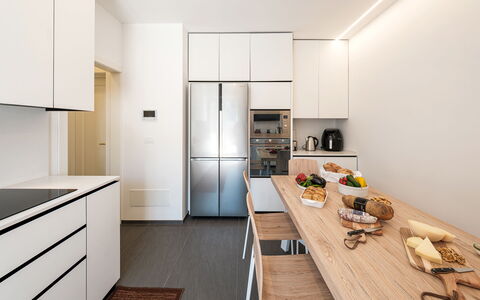 Villa Bellina 6: Kitchen, Countertop, Kitchen Appliance, Interior Design, Flooring, Furniture, Cabinetry, Major Appliance, Wood, Floor