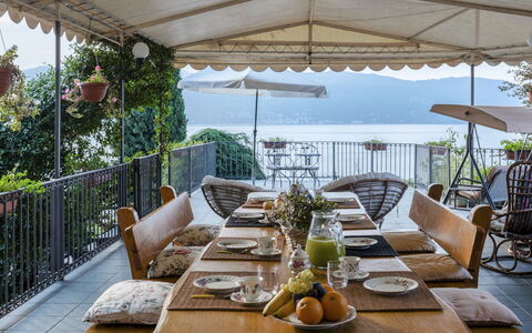Villa Eden 8: Furniture, Outdoor Furniture, Table, Chair, Outdoor Table, Balcony, Restaurant, Kitchen & Dining Room Table, Flowerpot, Shade
