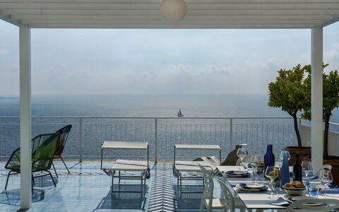 Villa Ponti 6: Furniture, Outdoor Furniture, Chair, Table, Sea, Outdoor Table, Ocean, Shade, Resort, Balcony
