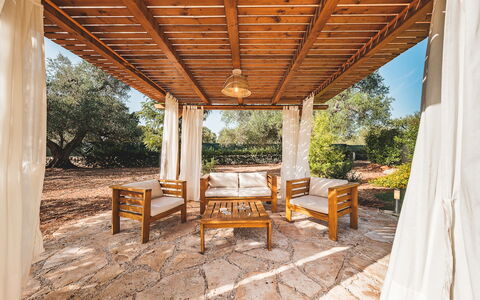 Trulli Biancapetra 8+2: Wood, Shade, Porch, Outdoor Structure, Hardwood, Wood Stain, Resort, Estate, Gazebo, Pavilion